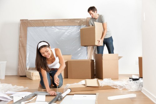 Removal team planning a house move in Leamouth near riverside apartments