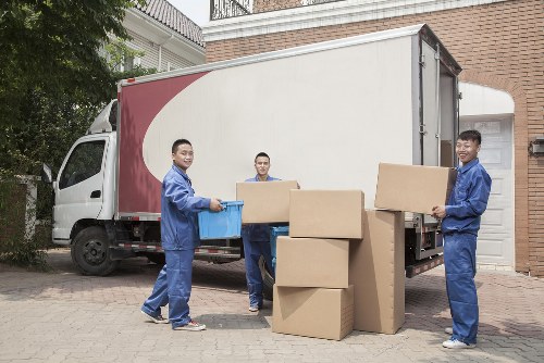 Careful loading of furniture into a removal van in Leamouth