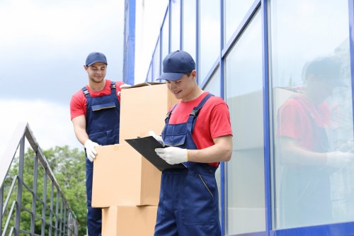 Local moving van service handling an apartment move in East London