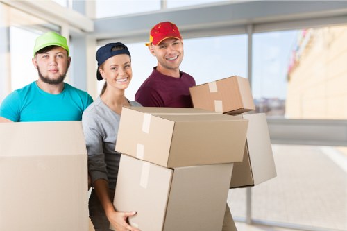 Office relocation planning in Leamouth with moving boxes and workspace setup