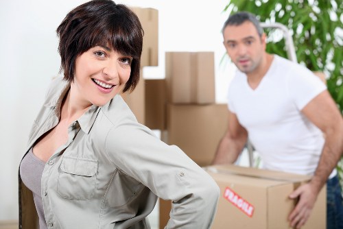 Loading household furniture into a removals truck