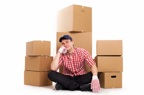 Furniture and equipment being moved during an office relocation in Leamouth