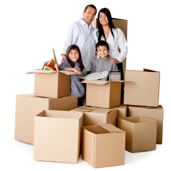Boxes and furniture being loaded into a moving van